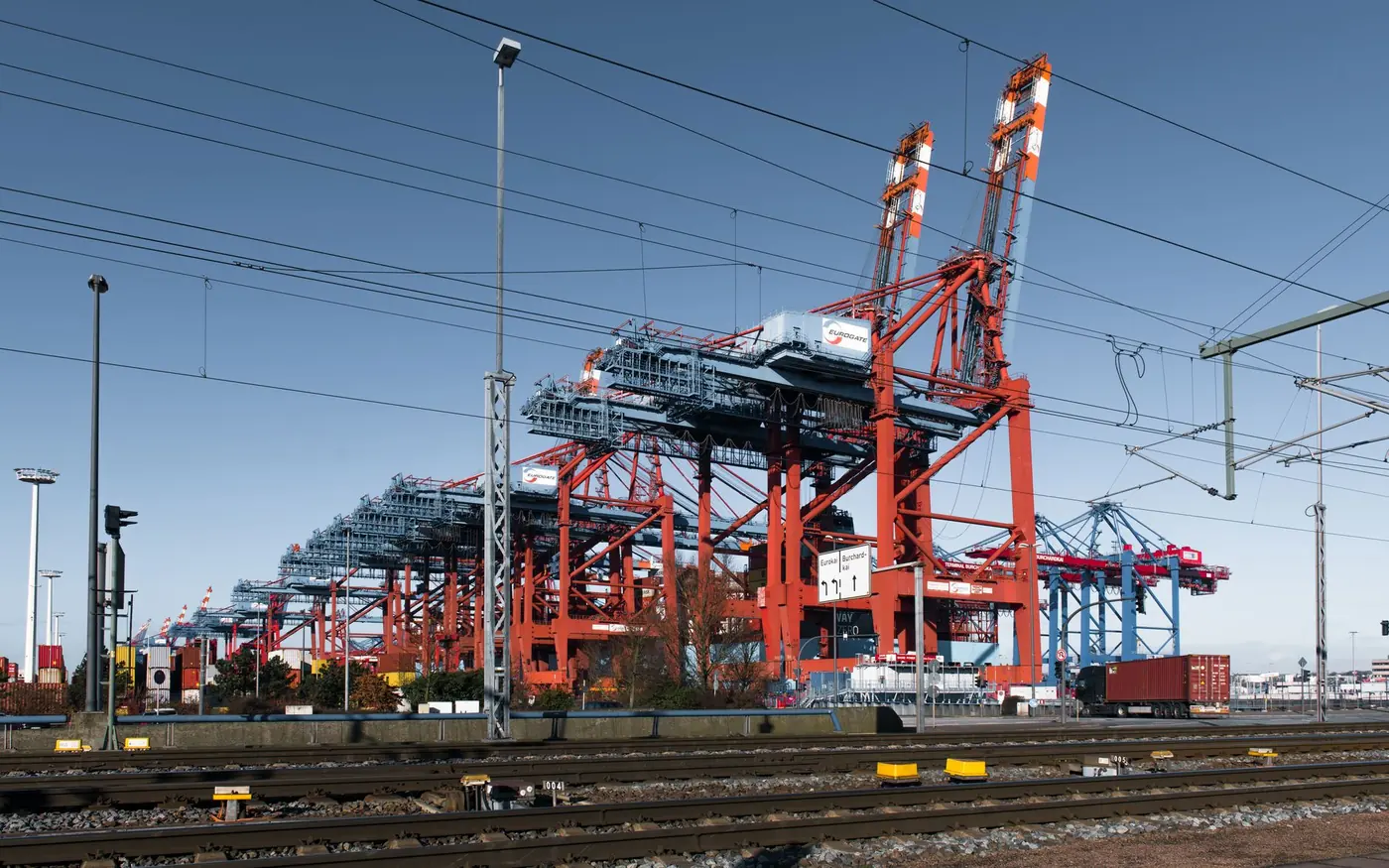 Gantry cranes and rail lines at a container terminal
